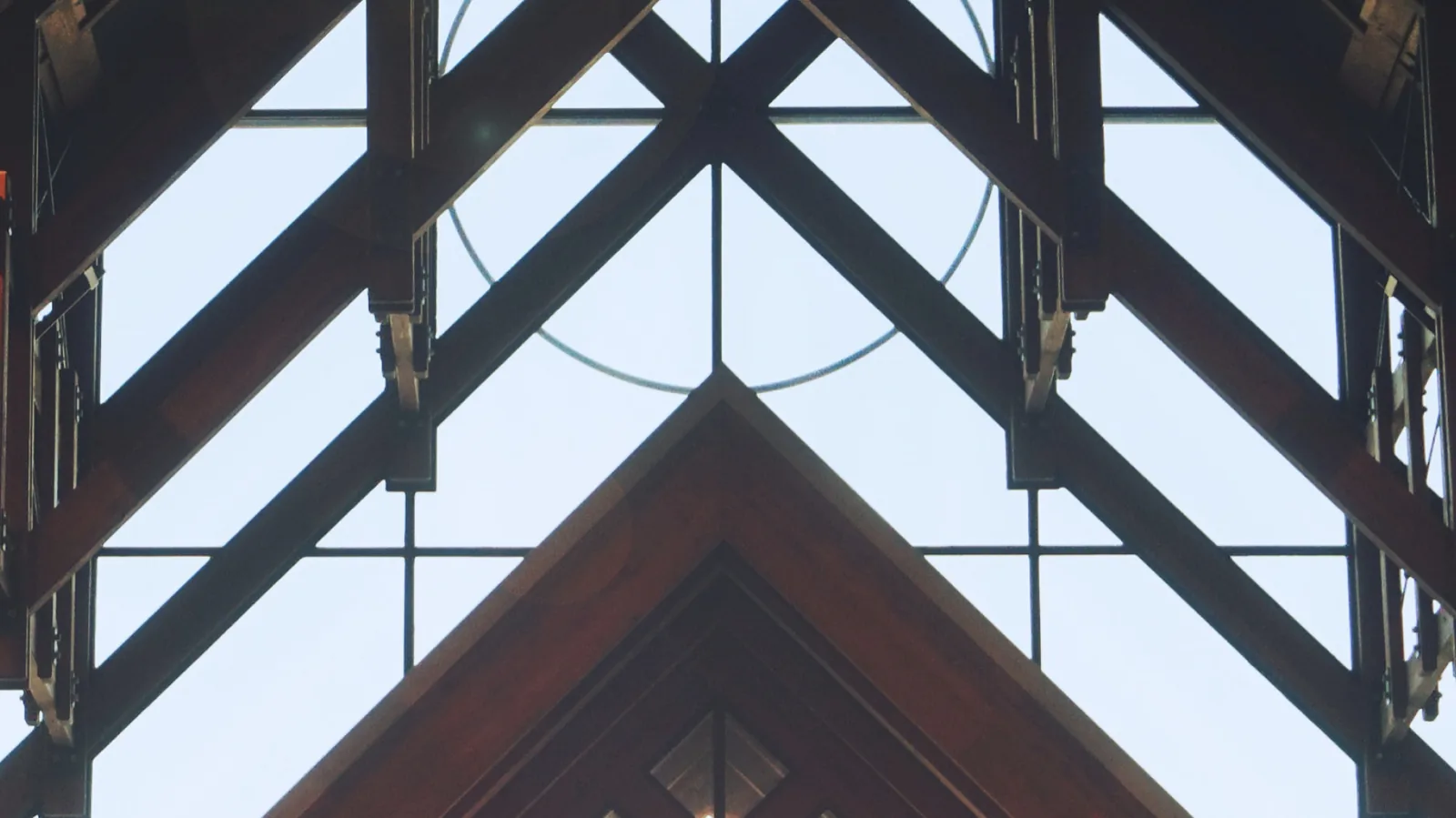 Timber roof trusses and clerestory windows inside a modern church building
