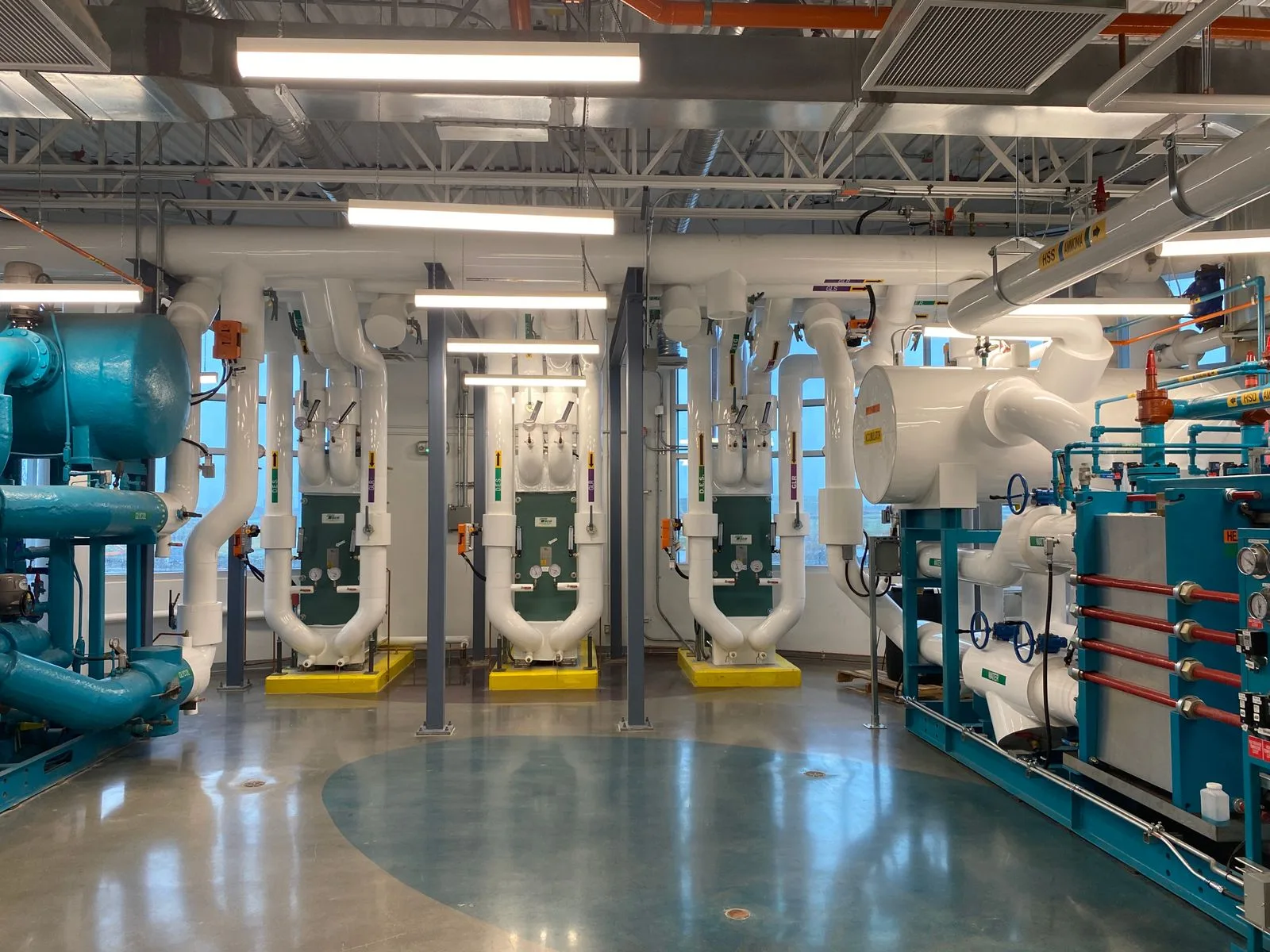 Mechanical plant room with pumps, pipework and building systems equipment