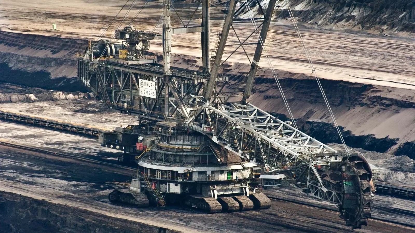 Bucket wheel excavator working a bench in an open pit mine